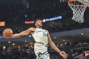 九游娱乐-字母哥在湖人比赛中出色防守，势不可挡引发热议！的简单介绍